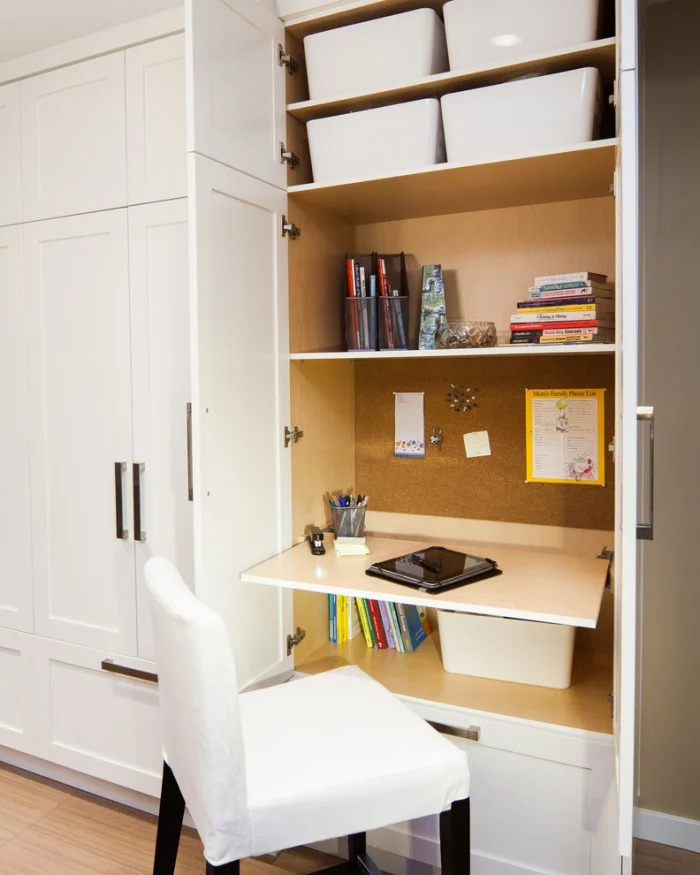 Wardrobe with hidden desk outlet